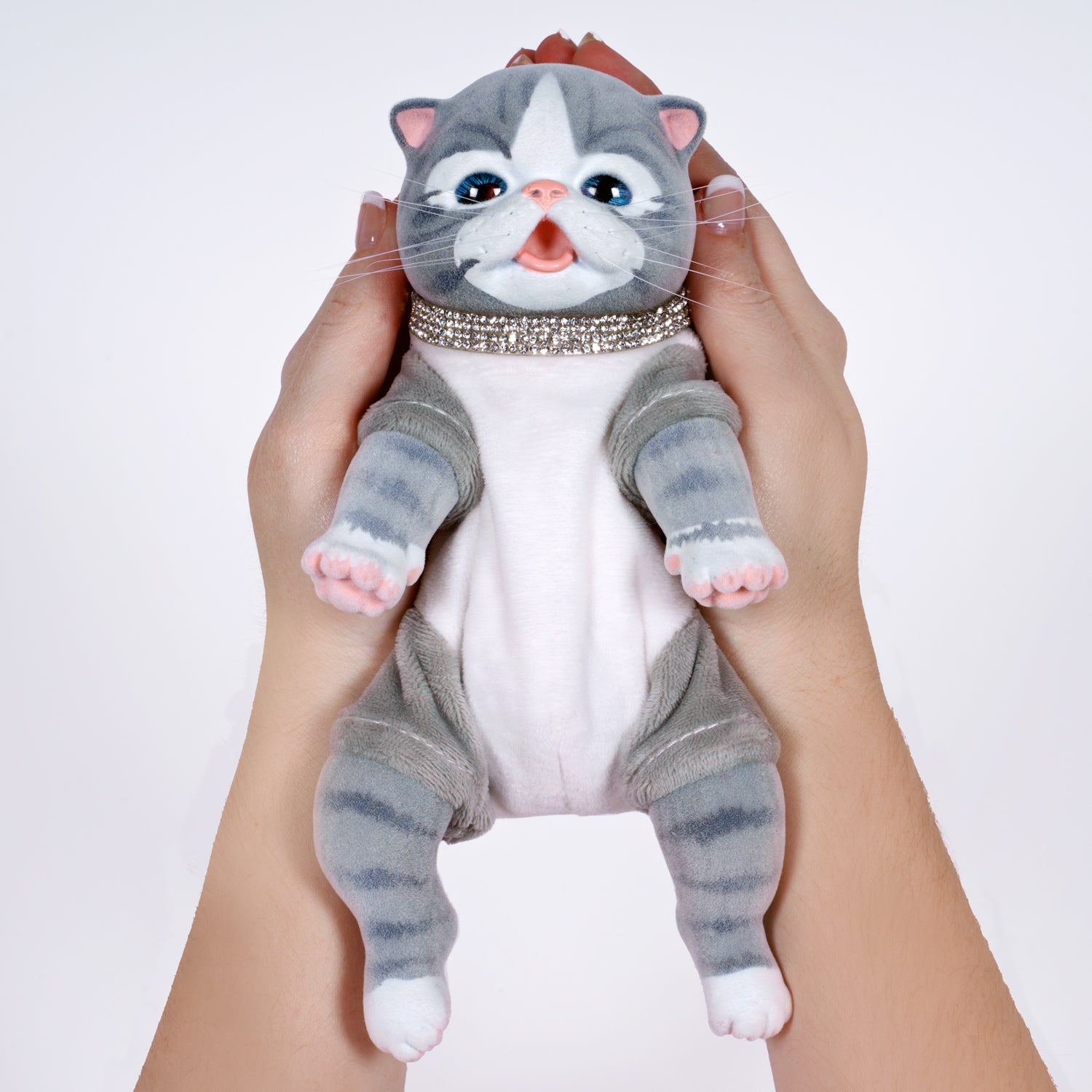9-inch realistic Baby Tabby Kitten doll inspired by an American Shorthair kitten. Sculpted by world-renowned artist Ping Lau, the Furever Babies Kitten collection by PG is made from our premium vinyl that is flocked for a velvety finish and a weighted plush body for that wonderfully lifelike feel