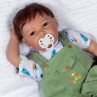 21 inch realistic toddler boy doll sculpted by doll artist Jannie de Lange. Crafted from our GentleTouch™ vinyl that gives that decadently soft and luxurious feel of real, baby-smooth skin, and comes with a weighted cloth body that features a more tapered realistic look and weighted bean bag bottom.