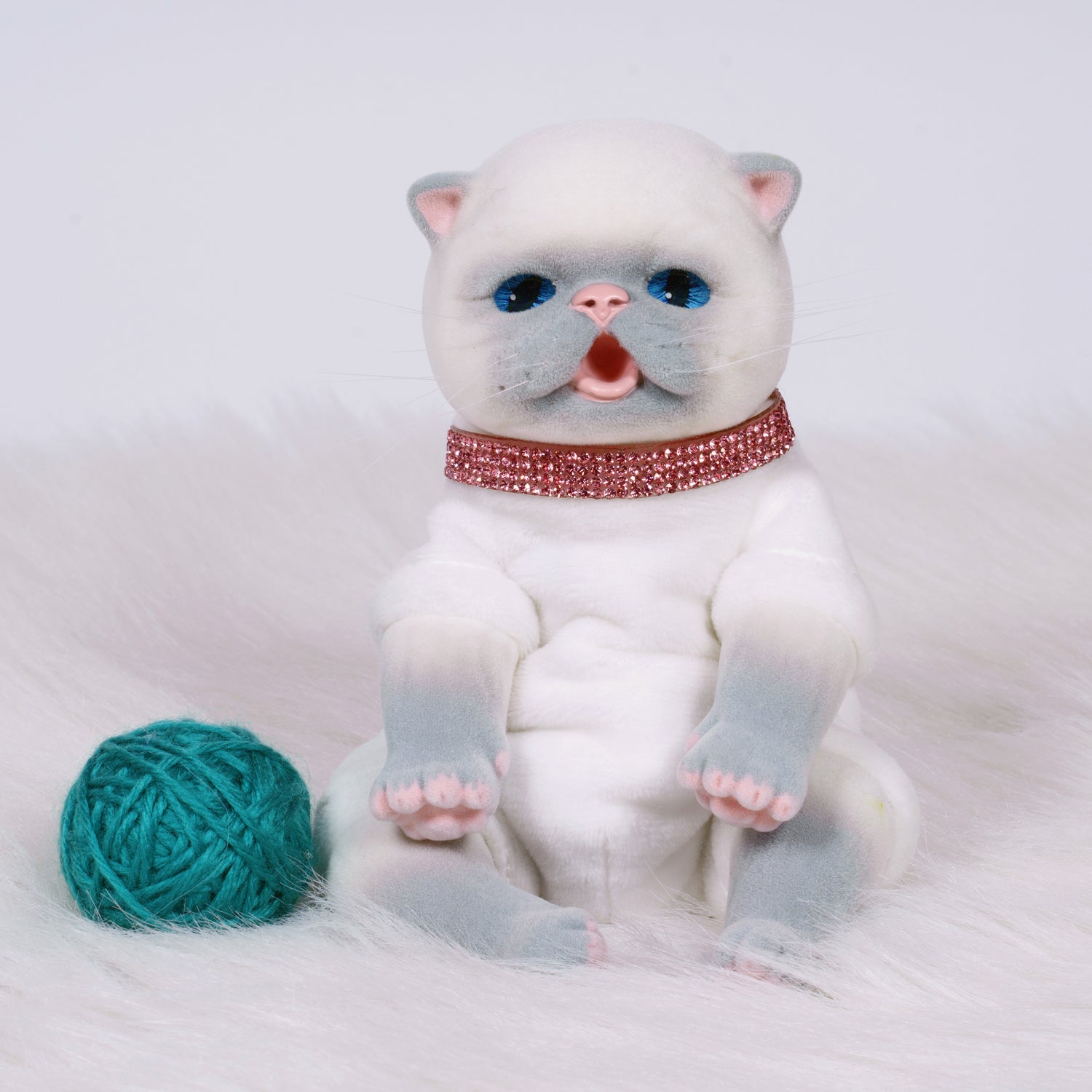 9-inch realistic Balinese Kitten doll, sculpted by world-renowned artist Ping Lau, the Furever Babies Kitten collection by PG is made from our premium vinyl that is flocked for a velvety finish and a weighted plush body for that wonderfully lifelike feel