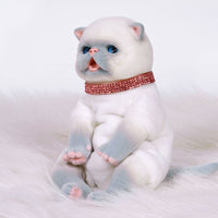 9-inch realistic Balinese Kitten doll, sculpted by world-renowned artist Ping Lau, the Furever Babies Kitten collection by PG is made from our premium vinyl that is flocked for a velvety finish and a weighted plush body for that wonderfully lifelike feel