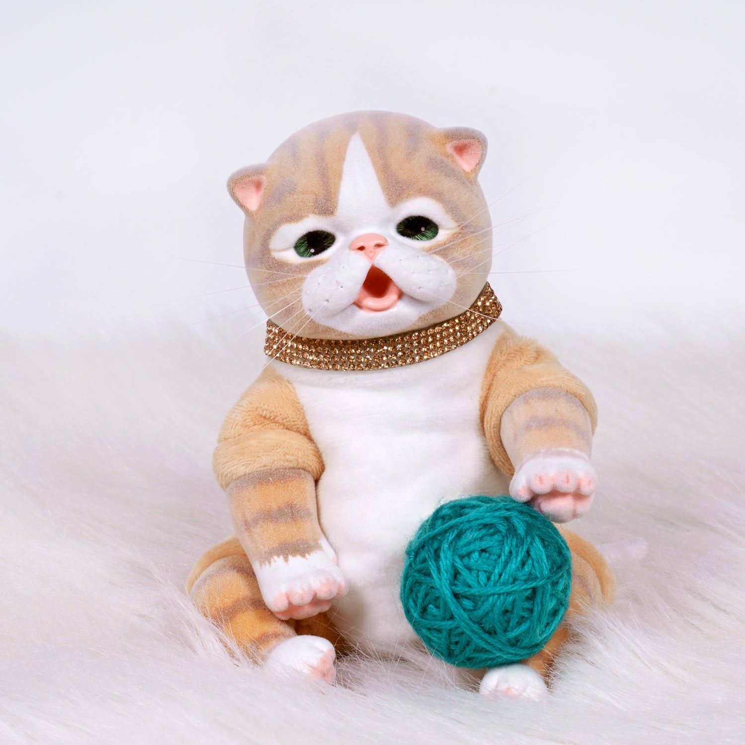 9-inch realistic Baby Orange Tabby Kitten doll inspired by an American Shorthair kitten. Sculpted by world-renowned artist Ping Lau, the Furever Babies Kitten collection by PG is made from our premium vinyl that is flocked for a velvety finish and a weighted plush body for that wonderfully lifelike feel