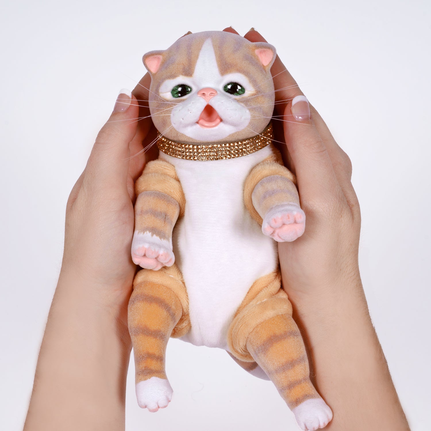 9-inch realistic Baby Orange Tabby Kitten doll inspired by an American Shorthair kitten. Sculpted by world-renowned artist Ping Lau, the Furever Babies Kitten collection by PG is made from our premium vinyl that is flocked for a velvety finish and a weighted plush body for that wonderfully lifelike feel